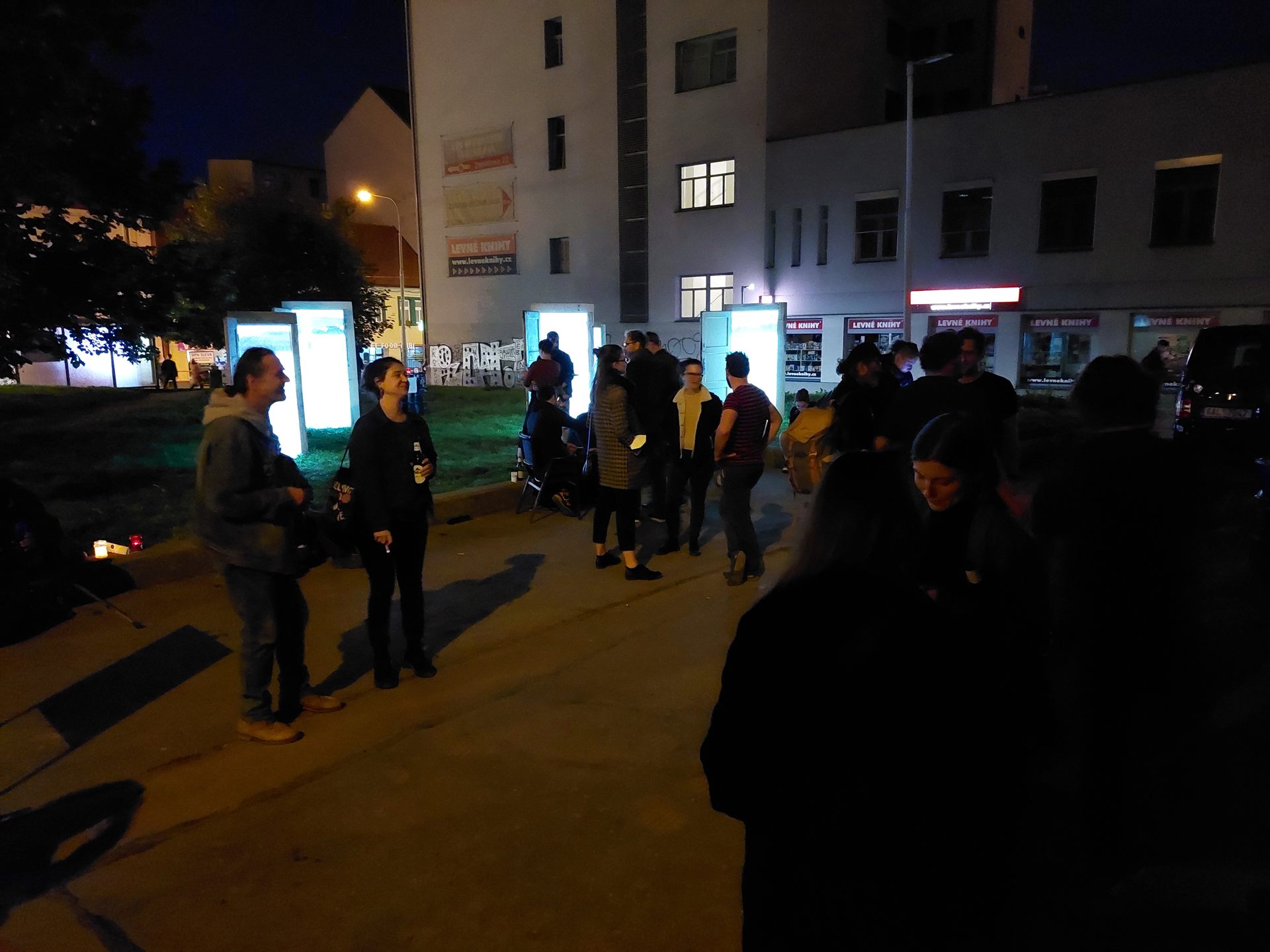 Visitors gathered on the street beside the installation.